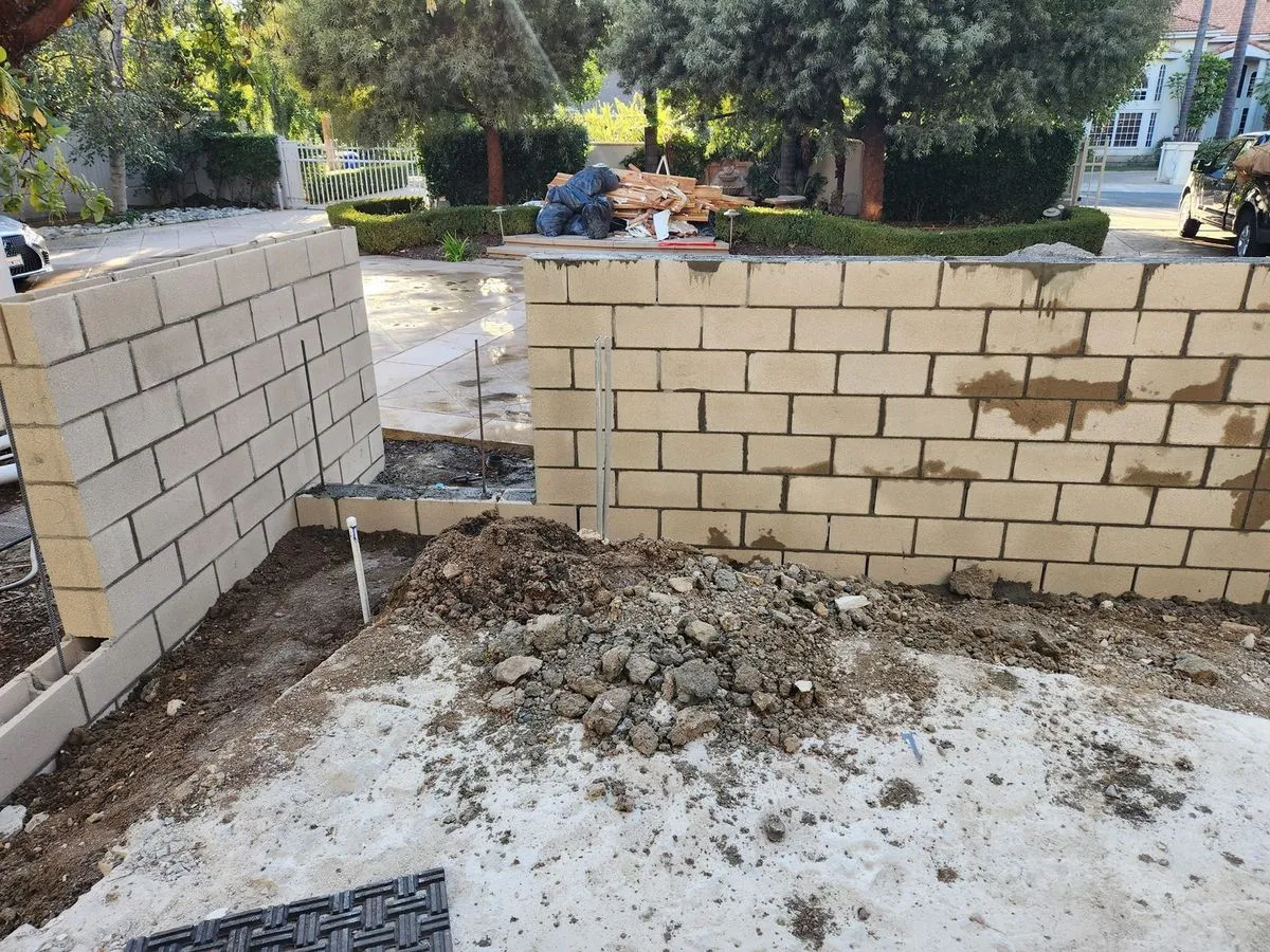 Cinder block retaining wall construction