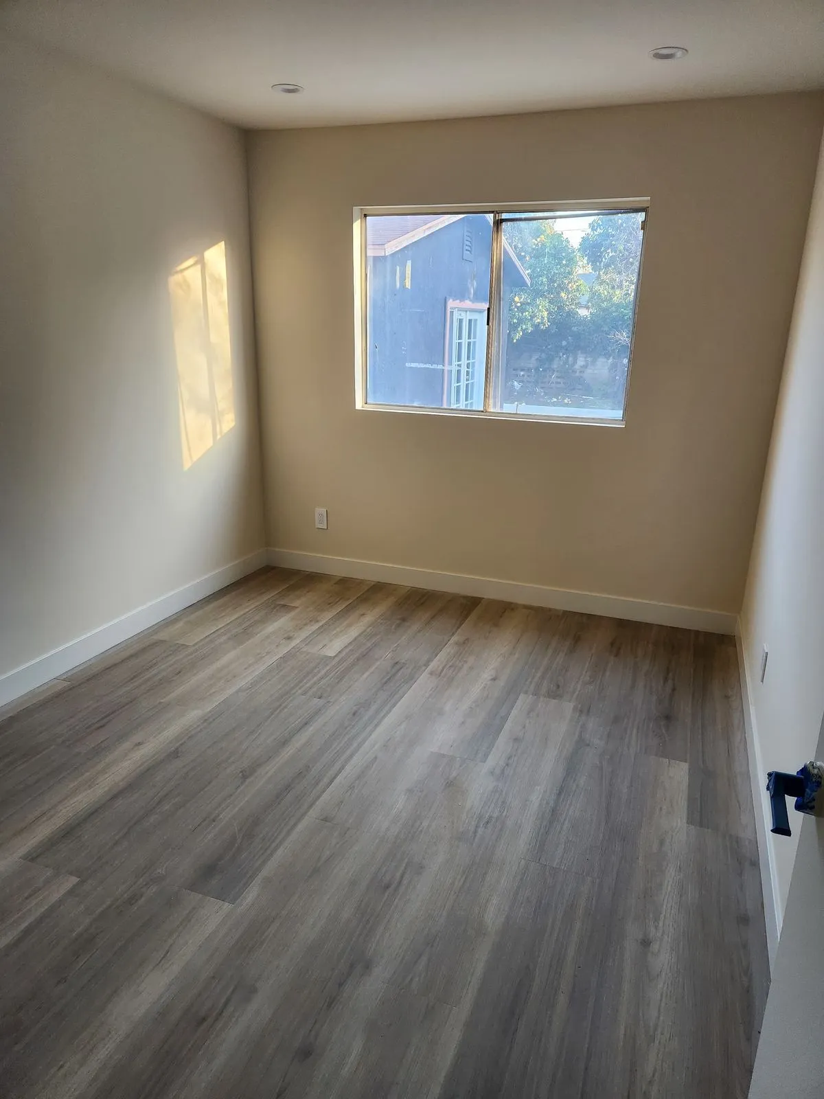 Room with new luxury vinyl plank flooring installed