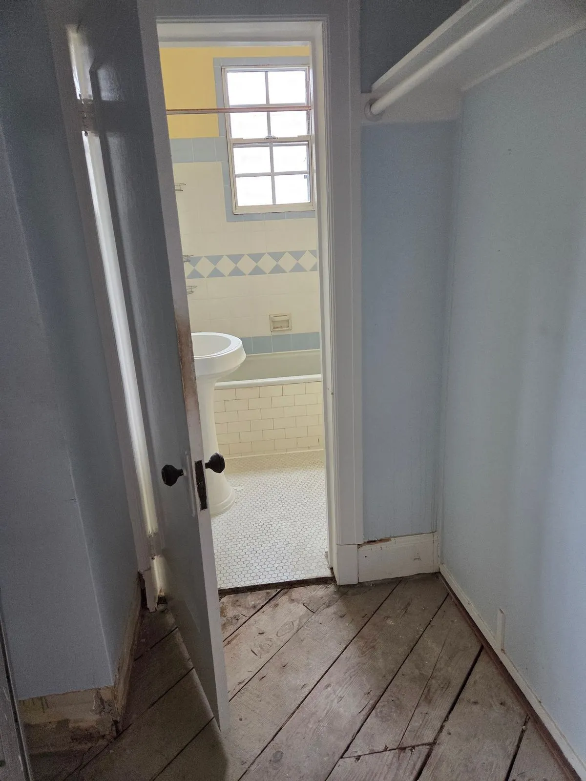 Hallway and bathroom pre-renovation